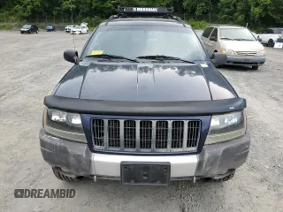 2004 Jeep Grand Cherokee Laredo with VIN 1J4GW48S64C160831, listed as a Copart auction lot 61920005 with 135,243 mi miles and Clean title. Bid and sale history available at DreamBid. Image 5.