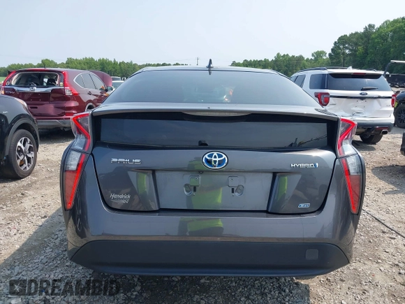 2016 Toyota Prius Four z VIN JTDKARFU1G3027589, wystawiony jako IAAI lot #42391692 z przebiegiem 172 255 mil mil oraz . Historia ofert i sprzedaży dostępna na DreamBid. Obrazek 16.