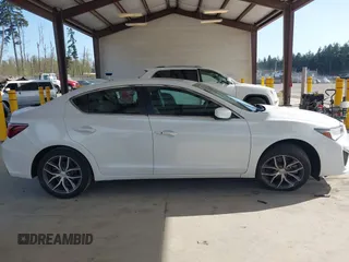 2019 Acura ILX Premium with VIN 19UDE2F77KA014270, listed as a IAAI auction lot 42023994 with 71,622 mi miles and . Bid and sale history available at DreamBid. Image 13.