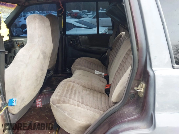 1995 Jeep Grand Cherokee Laredo with VIN 1J4GZ58S4SC778322, listed as a IAAI auction lot 41498800 with 255,058 mi miles. Bid and sale history available at carsss.com. Image 8.