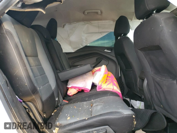 2016 Ford Escape SE z VIN 1FMCU0G74GUB15817, wystawiony jako Copart lot #52945435 z przebiegiem 153 737 mil mil oraz Szkoda całkowita • Salvage title. Historia ofert i sprzedaży dostępna na DreamBid. Obrazek 11.