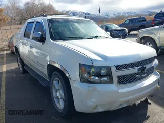 2011 Chevrolet Avalanche LTZ with VIN 3GNTKGE38BG349917, listed as a IAAI auction lot 41209473 with 210,616 mi miles. Bid and sale history available at carsss.com. Image 1.