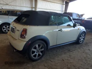 2010 MINI Convertible with VIN WMWMR3C59ATU98390, listed as a Copart auction lot 88820365 with 93,029 mi miles and Clean Title. Bid and sale history available at DreamBid. Image 3.