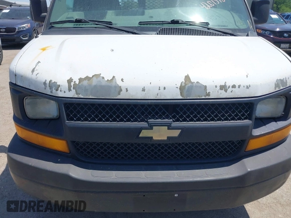 2011 Chevrolet Express Cargo Van with VIN 1GCZGUCGXB1114930, listed as a IAAI auction lot 42015104 with 364,789 mi miles. Bid and sale history available at carsss.com. Image 6.