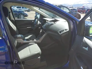 2014 Ford Escape SE with VIN 1FMCU9G99EUD02098, listed as a IAAI auction lot 41814969 with 210,218 mi miles and . Bid and sale history available at DreamBid. Image 5.