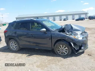 2016 Mazda CX-5 Touring with VIN JM3KE4CYXG0620990, listed as a IAAI auction lot 41978738 with 91,237 mi miles and . Bid and sale history available at carsss.com. Image 13.