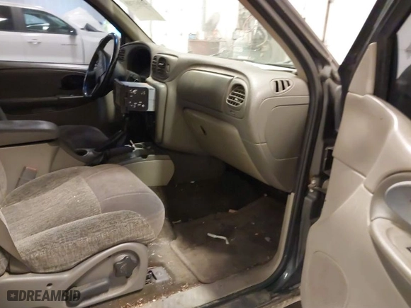 2003 Chevrolet TrailBlazer LS with VIN 1GNDT13S032254402, listed as a IAAI auction lot 41563789 with 216,912 mi miles. Bid and sale history available at carsss.com. Image 5.