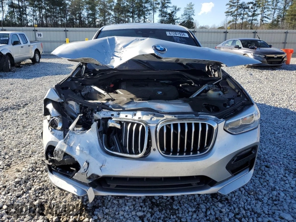 2021 BMW X4 xDrive30i with VIN 5UX2V1C04M9G96019, listed as a Copart auction lot 87287934 with Not provided miles and Salvage title. Bid and sale history available at DreamBid. Image 5.