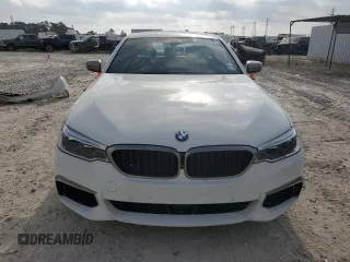 2018 BMW 5 Series M550i xDrive with VIN WBAJB9C58JG464461, listed as a Copart auction lot 53626575 with 62,436 mi miles and Salvage Title. Bid and sale history available at carsss.com. Image 5.