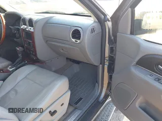 2008 GMC Envoy Denali with VIN 1GKES63M982258281, listed as a IAAI auction lot 42022548 with 265,129 mi miles. Bid and sale history available at carsss.com. Image 5.