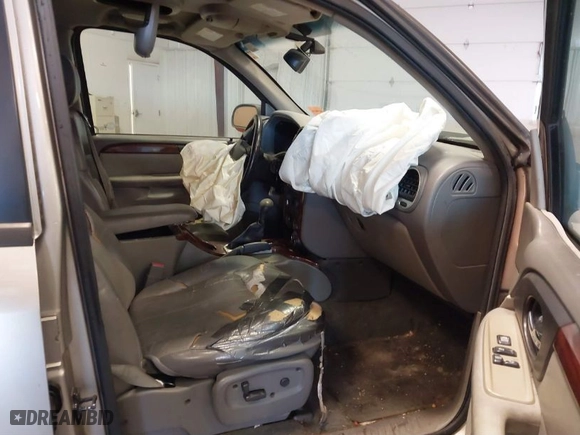 2003 GMC Envoy SLT with VIN 1GKDS13S932299354, listed as a IAAI auction lot 41238557 with 251,535 mi miles. Bid and sale history available at carsss.com. Image 5.