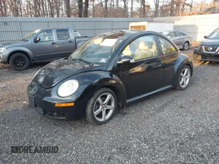 2010 Volkswagen New Beetle Coupe with VIN 3VWRG3AG9AM013681, listed as a IAAI auction lot 41177108 with 104,139 mi miles. Bid and sale history available at carsss.com. Image 2.