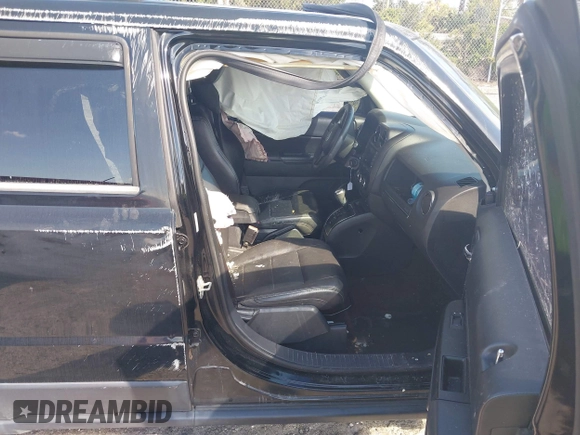 2014 Jeep Patriot Latitude with VIN 1C4NJPFA6ED680773, listed as a IAAI auction lot 41569916 with 135,590 mi miles and . Bid and sale history available at carsss.com. Image 5.