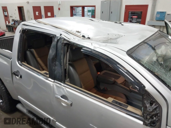 2004 Nissan Titan LE with VIN 1N6AA07B44N512889, listed as a IAAI auction lot 41569019 with 154,655 mi miles. Bid and sale history available at carsss.com. Image 6.