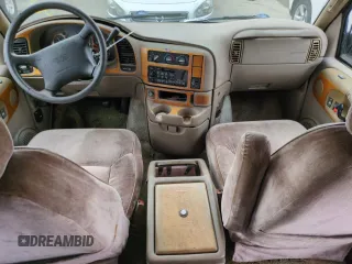 1997 GMC Safari z VIN 1GDDM19W5VB544214, wystawiony jako Copart lot #74226704 z przebiegiem Nie podano mil oraz Szkody całkowita. Historia ofert i sprzedaży dostępna na DreamBid. Obrazek 8.