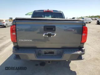 2015 Chevrolet Colorado 2WD Z71 with VIN 1GCGSCE39F1255925, listed as a Copart auction lot 63457735 with 119,801 mi miles and Salvage title. Bid and sale history available at DreamBid. Image 6.