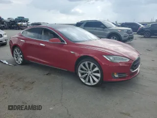 2013 Tesla Model S with VIN 5YJSA1AG7DFP12228, listed as a Copart auction lot 60040665 with 87,674 mi miles and Clean title. Bid and sale history available at DreamBid. Image 4.