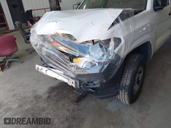 2020 Toyota Tacoma SR with VIN 5TFRX5GN1LX177797, listed as a IAAI auction lot 41882427 with 107,787 mi miles and . Bid and sale history available at DreamBid. Image 6.