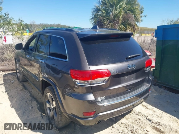 2014 Jeep Grand Cherokee Overland with VIN 1C4RJECG8EC409976, listed as a IAAI auction lot 41821685 with 186,105 mi miles. Bid and sale history available at carsss.com. Image 3.