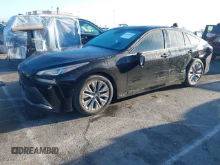 2022 Toyota Mirai XLE with VIN JTDAAAAA9NA007013, listed as a IAAI auction lot 41744965 with 23,243 mi miles and . Bid and sale history available at DreamBid. Image 2.