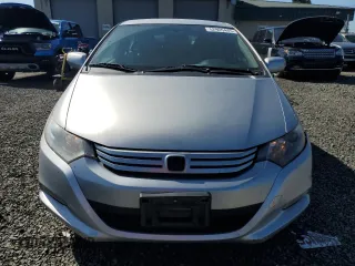 2010 Honda Insight EX z VIN JHMZE2H74AS034758, wystawiony jako Copart lot #52905445 z przebiegiem 154 148 mil mil oraz Szkoda całkowita • Salvage title. Historia ofert i sprzedaży dostępna na DreamBid. Obrazek 5.