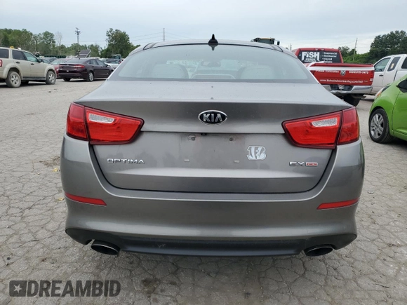 2015 Kia Optima EX with VIN 5XXGN4A75FG455808, listed as a Copart auction lot 60848114 with 130,643 mi miles and Salvage Title. Bid and sale history available at carsss.com. Image 6.