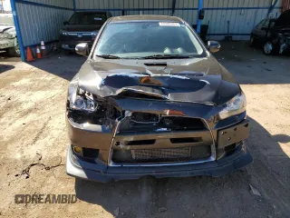 2015 Mitsubishi Lancer Evolution MR z VIN JA32W5FV5FU006111, wystawiony jako Copart lot #68985683 z przebiegiem 54 774 mil mil oraz . Historia ofert i sprzedaży dostępna na DreamBid. Obrazek 5.