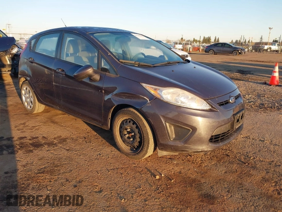 2013 Ford Fiesta S with VIN 3FADP4TJ8DM132523, listed as a IAAI auction lot 41700402 with 53,835 mi miles and . Bid and sale history available at DreamBid. Image 1.