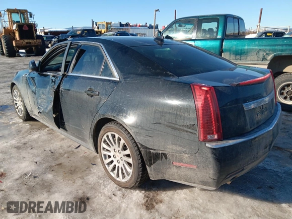 2013 Cadillac CTS Performance with VIN 1G6DK5E33D0111422, listed as a Copart auction lot 50121745 with 129,335 mi miles and Salvage Title. Bid and sale history available at DreamBid. Image 2.