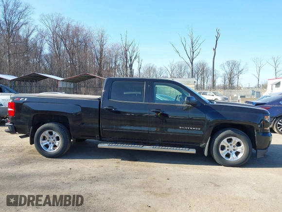 2018 Chevrolet Silverado 1500 LT with VIN 1GCUKREC3JF119906, listed as a IAAI auction lot 41765398 with 122,472 mi miles and . Bid and sale history available at DreamBid. Image 13.