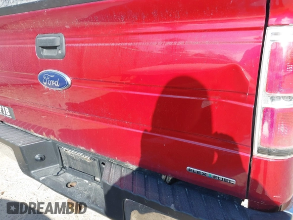 2014 Ford F-150 XL with VIN 1FTFW1EF7EFA32296, listed as a IAAI auction lot 41986227 with 206,050 mi miles. Bid and sale history available at carsss.com. Image 20.