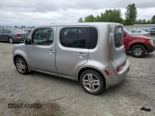 2011 Nissan Cube S z VIN JN8AZ2KR7BT203409, wystawiony jako Copart lot #57001145 z przebiegiem 127 446 mil mil oraz Tytuł czysty. Historia ofert i sprzedaży dostępna na DreamBid. Obrazek 2.