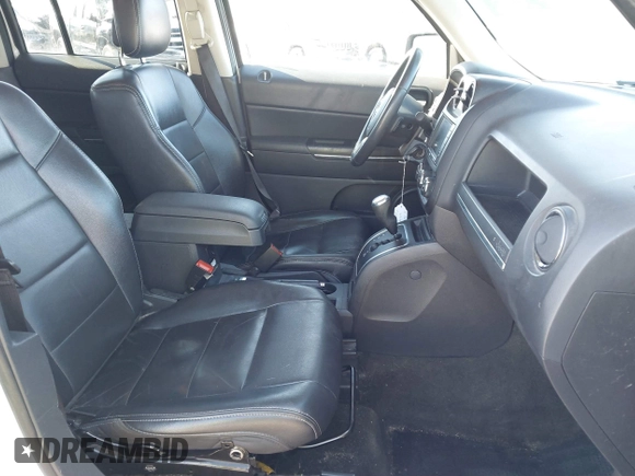 2014 Jeep Patriot Limited with VIN 1C4NJRCB5ED634120, listed as a IAAI auction lot 41394366 with 139,859 mi miles. Bid and sale history available at carsss.com. Image 5.