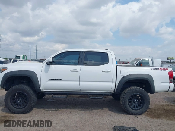 2017 Toyota Tacoma SR5 z VIN 5TFCZ5AN1HX116806, wystawiony jako IAAI lot #41839628 z przebiegiem 90 197 mil mil oraz . Historia ofert i sprzedaży dostępna na DreamBid. Obrazek 15.