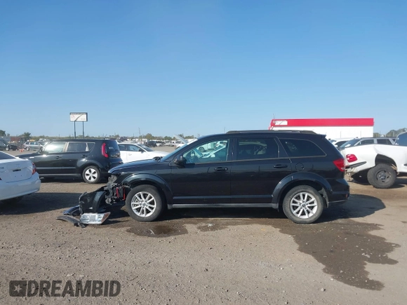 2013 Dodge Journey SXT with VIN 3C4PDCBG7DT710844, listed as a IAAI auction lot 40582910 with 136,741 mi miles and . Bid and sale history available at DreamBid. Image 14.