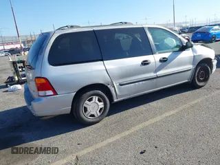 2003 Ford Windstar LX with VIN 2FMZA51413BA16113, listed as a IAAI auction lot 41850359 with 128,768 mi miles and . Bid and sale history available at DreamBid. Image 4.