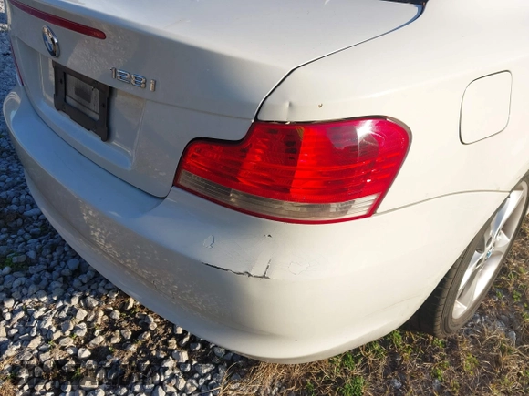 2009 BMW 1 Series 128i with VIN WBAUP93579VF49106, listed as a IAAI auction lot 41443690 with Not provided miles and . Bid and sale history available at DreamBid. Image 6.