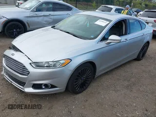 2014 Ford Fusion Titanium with VIN 3FA6P0K95ER151625, listed as a IAAI auction lot 42109141 with 182,328 mi miles and . Bid and sale history available at DreamBid. Image 2.