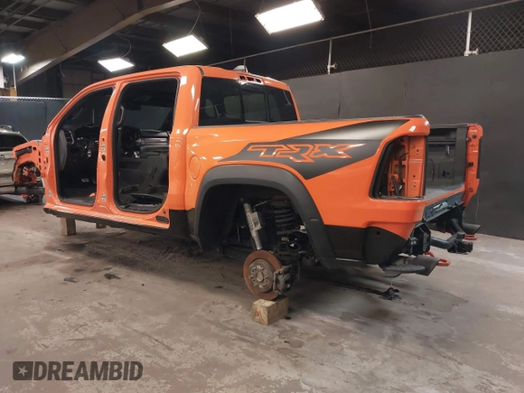 2022 Ram 1500 TRX with VIN 1C6SRFU9XNN149317, listed as a IAAI auction lot 41804066 with 42,856 mi miles. Bid and sale history available at carsss.com. Image 3.