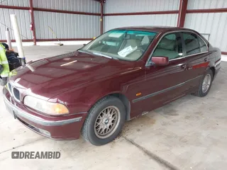 1997 BMW 5 Series 528iA with VIN WBADD6323VBW15656, listed as a IAAI auction lot 41777667 with 142,443 mi miles. Bid and sale history available at carsss.com. Image 2.