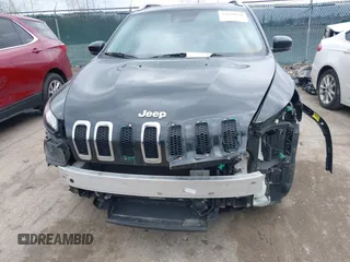 2014 Jeep Cherokee Limited with VIN 1C4PJLDS4EW115066, listed as a IAAI auction lot 41850944 with 125,980 mi miles. Bid and sale history available at carsss.com. Image 13.
