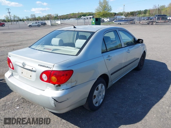 2003 Toyota Corolla CE with VIN 1NXBR32E23Z015648, listed as a IAAI auction lot 42056596 with 287,999 mi miles and . Bid and sale history available at DreamBid. Image 4.