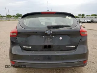 2018 Ford Focus Titanium z VIN 1FADP3N2XJL289659, wystawiony jako Copart lot #65594275 z przebiegiem 115 739 mil mil oraz Czysty tytuł • Clean title. Historia ofert i sprzedaży dostępna na DreamBid. Obrazek 6.