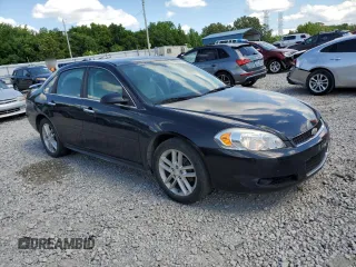 2014 Chevrolet Impala LTZ with VIN 2G1WC5E33E1164638, listed as a Copart auction lot 58699635 with 189,636 mi miles and Salvage title. Bid and sale history available at DreamBid. Image 4.