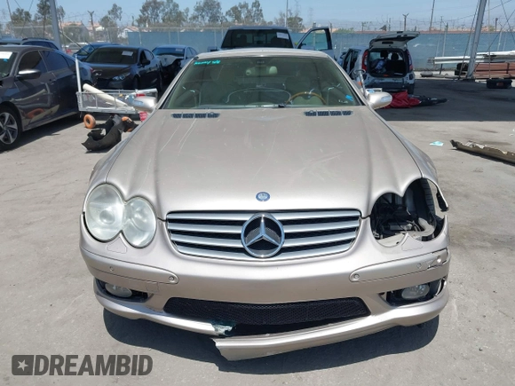 2005 Mercedes-Benz SL 500 z VIN WDBSK75F75F090730, wystawiony jako IAAI lot #42278730 z przebiegiem 83 765 mil mil oraz . Historia ofert i sprzedaży dostępna na DreamBid. Obrazek 13.