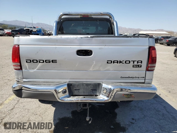 2004 Dodge Dakota SLT with VIN 1D7HG48N74S509797, listed as a Copart auction lot 57797055 with 214,275 mi miles and Salvage title. Bid and sale history available at DreamBid. Image 6.