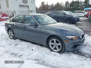 2015 BMW 3 Series 328i xDrive with VIN WBA3B5G55FNS14903, listed as a IAAI auction lot 41497975 with 62,009 mi miles. Bid and sale history available at carsss.com. Image 1.