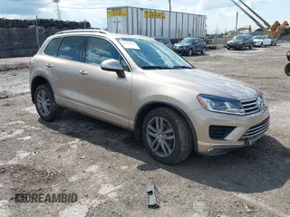 2015 Volkswagen Touareg Lux с VIN WVGEP9BP1FD004040, выставлен на аукционе IAAI как лот 42226300 с пробегом 117 878 миль миль и . История ставок и продаж доступна на DreamBid. Изображение 1.