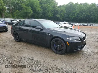 2014 BMW M5 z VIN WBSFV9C58ED097285, wystawiony jako Copart lot #55835345 z przebiegiem 108 189 mil mil oraz Szkody całkowita. Historia ofert i sprzedaży dostępna na DreamBid. Obrazek 4.