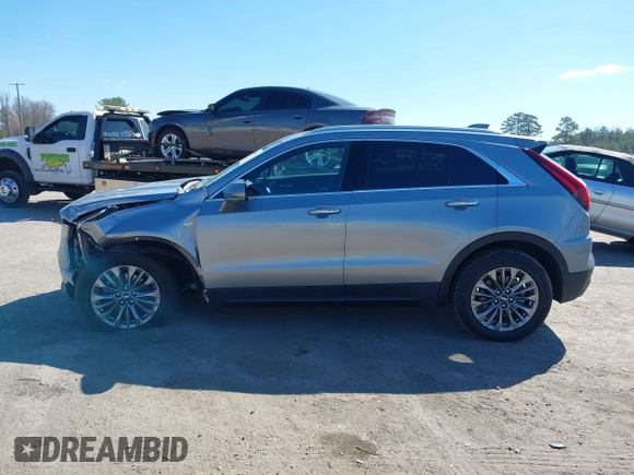2025 Cadillac XT4 AWD Premium Luxury with VIN 1GYFZDR48SF138618, listed as a IAAI auction lot 41889219 with 7,823 mi miles and . Bid and sale history available at DreamBid. Image 14.